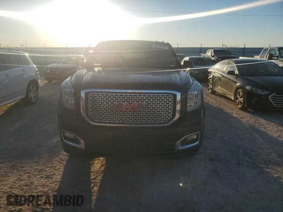 2015 GMC Yukon Denali with VIN 1GKS1CKJ7FR132677, listed as a Copart auction lot 82118584 with 144,798 mi miles and Salvage Title. Bid and sale history available at carsss.com. Image 5.