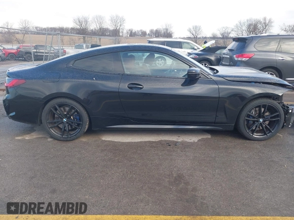 2021 BMW 4 Series M440i xDrive with VIN WBA13AR05MCG58597, listed as a IAAI auction lot 41475262 with 42,626 mi miles and . Bid and sale history available at DreamBid. Image 13.
