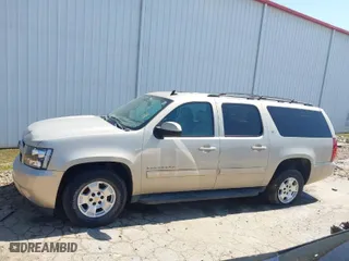 2012 Chevrolet Suburban LT with VIN 1GNSCJE03CR128206, listed as a IAAI auction lot 42002119 with 329,078 mi miles. Bid and sale history available at carsss.com. Image 14.