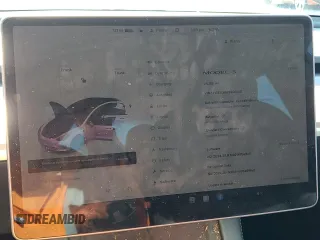 2023 Tesla Model 3 z VIN 5YJ3E1EA5PF401240, wystawiony jako Copart lot #56548895 z przebiegiem 25 188 mil mil oraz Szkoda całkowita • Salvage title. Historia ofert i sprzedaży dostępna na DreamBid. Obrazek 9.