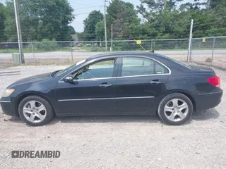 2005 Acura RL z VIN JH4KB16545C018873, wystawiony jako IAAI lot #42423476 z przebiegiem 237 834 mil mil oraz . Historia ofert i sprzedaży dostępna na DreamBid. Obrazek 14.