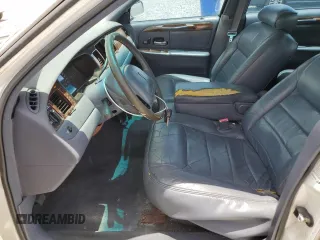 1999 Lincoln Town Car Executive z VIN 1LNHM81WXXY627319, wystawiony jako Copart lot #60830165 z przebiegiem 122 118 mil mil oraz Szkoda całkowita • Salvage title. Historia ofert i sprzedaży dostępna na DreamBid. Obrazek 7.