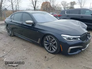 2018 BMW 7 Series M760i xDrive with VIN WBA7H6C54JG614413, listed as a IAAI auction lot 40930506 with 50,706 mi miles. Bid and sale history available at carsss.com. Image 1.