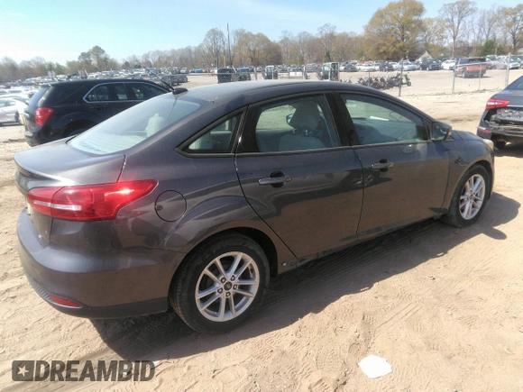 2015 Ford Focus SE with VIN 1FADP3F28FL292520, listed as a IAAI auction lot 41906723 with 74,106 mi miles. Bid and sale history available at carsss.com. Image 4.