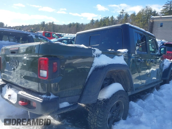 2023 Jeep Gladiator Rubicon with VIN 1C6JJTBG6PL576818, listed as a IAAI auction lot 41515428 with 10,271 mi miles and . Bid and sale history available at DreamBid. Image 4.