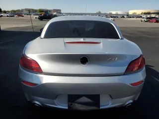 2011 BMW Z4 sDrive35is with VIN WBALM1C54BE633439, listed as a Copart auction lot 60327265 with 112,302 mi miles and Salvage title. Bid and sale history available at DreamBid. Image 6.