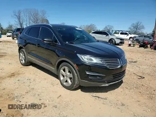 2015 Lincoln MKC z VIN 5LMCJ2A91FUJ33265, wystawiony jako Copart lot #49712835 z przebiegiem 144 723 mil mil oraz Szkoda całkowita • Salvage title. Historia ofert i sprzedaży dostępna na DreamBid. Obrazek 11.