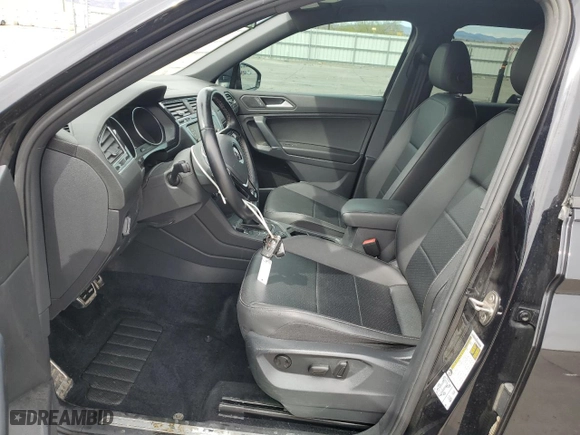 2020 Volkswagen Tiguan SE with VIN 3VV2B7AX8LM114368, listed as a Copart auction lot 50949875 with 69,046 mi miles and Salvage Title. Bid and sale history available at carsss.com. Image 7.