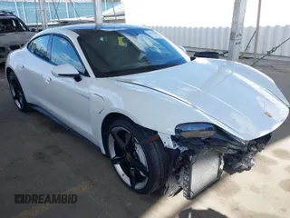 2022 Porsche Taycan 4S with VIN WP0AB2Y15NSA44193, listed as a IAAI auction lot 41974868 with 28,993 mi miles and . Bid and sale history available at DreamBid. Image 1.