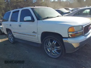 2005 GMC Yukon SLT with VIN 1GKEC13T85R204447, listed as a IAAI auction lot 41660892 with 260,209 mi miles. Bid and sale history available at carsss.com. Image 1.