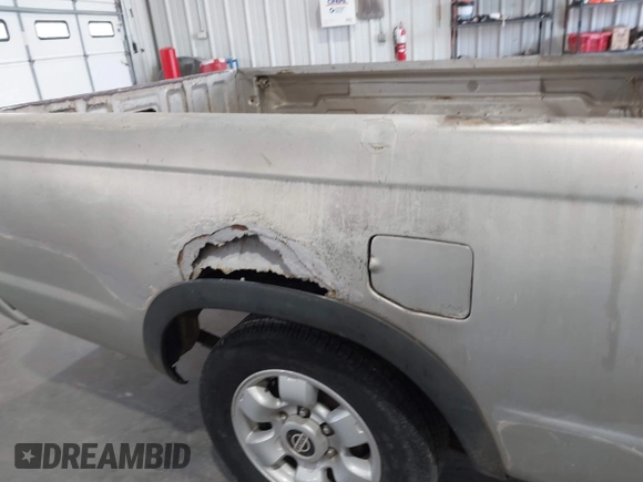 1998 Nissan Frontier XE with VIN 1N6DD21S9WC331083, listed as a IAAI auction lot 42202743 with 205,221 mi miles and . Bid and sale history available at DreamBid. Image 6.