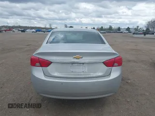 2014 Chevrolet Impala LT with VIN 1G1125S34EU123487, listed as a IAAI auction lot 42088001 with 184,553 mi miles and . Bid and sale history available at DreamBid. Image 16.