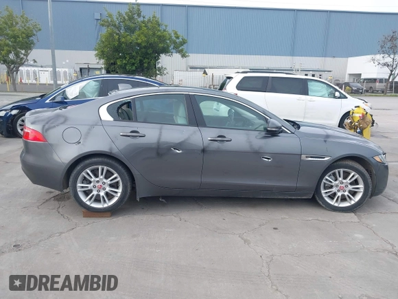 2017 Jaguar XE 25t Premium with VIN SAJAD4BG0HA975017, listed as a IAAI auction lot 41589536 with 40,136 mi miles. Bid and sale history available at carsss.com. Image 12.