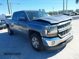 2016 Chevrolet Silverado 1500 LT with VIN 3GCUKREC8GG219524, listed as a IAAI auction lot 41087657 with 123,010 mi miles and . Bid and sale history available at DreamBid. Image 1.