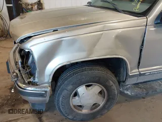 1999 Chevrolet Tahoe Z71 with VIN 1GNEK13R7XJ577796, listed as a IAAI auction lot 41036617 with 231,795 mi miles and . Bid and sale history available at DreamBid. Image 12.