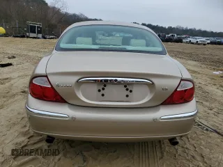 2003 Jaguar S-Type z VIN SAJEA01U33HM71782, wystawiony jako Copart lot #82969304 z przebiegiem 127 176 mil mil oraz Szkody całkowita. Historia ofert i sprzedaży dostępna na DreamBid. Obrazek 6.