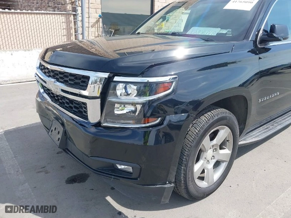 2017 Chevrolet Suburban LT with VIN 1GNSKHKC1HR202658, listed as a IAAI auction lot 41765090 with NaN miles. Bid and sale history available at carsss.com. Image 18.