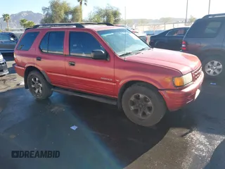 1999 Isuzu Rodeo S with VIN 4S2CK58W3X4307201, listed as a IAAI auction lot 41884901 with 236,970 mi miles. Bid and sale history available at carsss.com. Image 1.