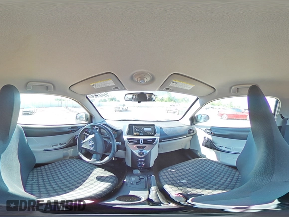 2012 Scion iQ with VIN JTNJJXB05CJ010539, listed as a Copart auction lot 56489245 with 114,623 mi miles and Salvage title. Bid and sale history available at DreamBid. Image 14.