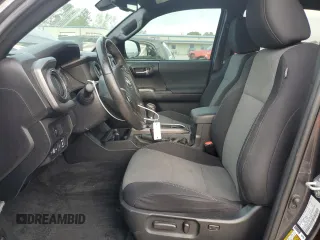 2021 Toyota Tacoma SR z VIN 3TMCZ5ANXMM433788, wystawiony jako Copart lot #51614785 z przebiegiem 58 157 mil mil oraz Czysty tytuł • Clean title. Historia ofert i sprzedaży dostępna na DreamBid. Obrazek 7.
