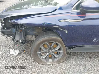 2022 Volkswagen Tiguan SE с VIN 3VV2B7AX1NM165598, выставлен на аукционе IAAI как лот 42321305 с пробегом 43 483 миль миль и . История ставок и продаж доступна на DreamBid. Изображение 6.