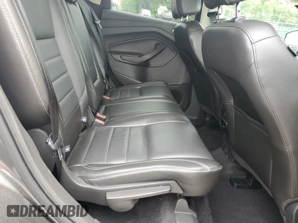 2016 Ford Escape Titanium with VIN 1FMCU9J90GUA01974, listed as a Copart auction lot 60376265 with 177,384 mi miles and Salvage title. Bid and sale history available at DreamBid. Image 11.