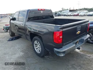 2014 Chevrolet Silverado 1500 LT with VIN 3GCPCREC7EG135069, listed as a IAAI auction lot 41999001 with 208,720 mi miles and . Bid and sale history available at DreamBid. Image 3.