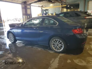2015 BMW 2 Series 228i with VIN WBA1F5C54FVW98189, listed as a Copart auction lot 61815175 with 67,216 mi miles and Salvage title. Bid and sale history available at DreamBid. Image 2.