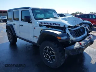 2024 Jeep Wrangler Rubicon with VIN 1C4PJXFG6RW291185, listed as a IAAI auction lot 41773050 with 12,400 mi miles and . Bid and sale history available at DreamBid. Image 1.