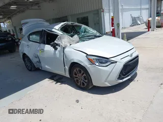 2019 Toyota Yaris L z VIN 3MYDLBYV8KY503872, wystawiony jako IAAI lot #42767964 z przebiegiem 103 535 mil mil oraz . Historia ofert i sprzedaży dostępna na DreamBid. Obrazek 1.