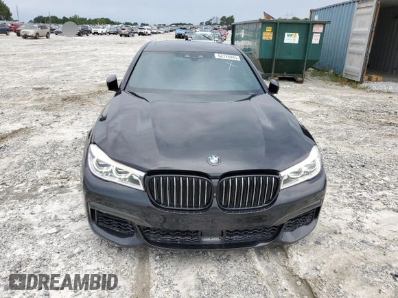 2019 BMW 7 Series 750i with VIN WBA7F0C57KGM25906, listed as a Copart auction lot 62728443 with 61,561 mi miles. Bid and sale history available at carsss.com. Image 5.