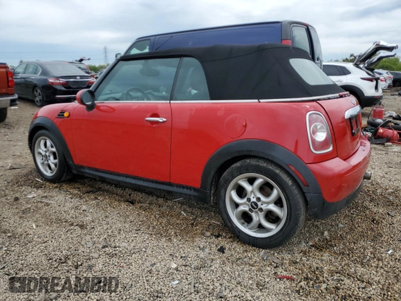 2012 MINI Convertible with VIN WMWZN3C58CT134224, listed as a Copart auction lot 57610015 with 141,394 mi miles and Salvage title. Bid and sale history available at DreamBid. Image 2.