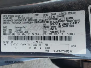 2013 Ford Fiesta S with VIN 3FADP4TJ8DM132523, listed as a IAAI auction lot 41700402 with 53,835 mi miles and . Bid and sale history available at DreamBid. Image 9.
