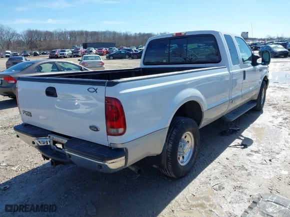 2002 Ford Super Duty F-250 XL with VIN 1FTNX20L12EB84751, listed as a IAAI auction lot 41672873 with 114,507 mi miles. Bid and sale history available at carsss.com. Image 4.
