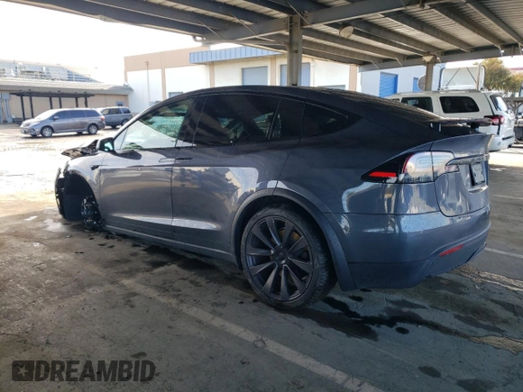 2023 Tesla Model X with VIN 7SAXCDE55PF410146, listed as a Copart auction lot 48818085 with 26,494 mi miles and Salvage Title. Bid and sale history available at DreamBid. Image 2.