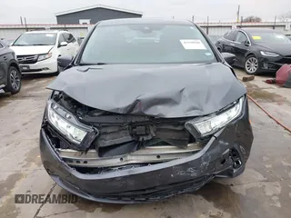 2021 Honda Odyssey Touring with VIN 5FNRL6H86MB021504, listed as a IAAI auction lot 41550040 with 55,068 mi miles. Bid and sale history available at carsss.com. Image 6.