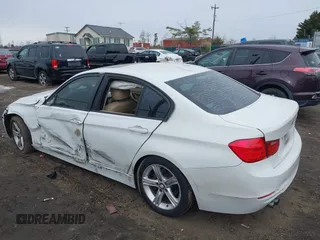 2013 BMW 3 Series 328i with VIN WBA3C1G57DNR49126, listed as a IAAI auction lot 41334342 with 164,710 mi miles and . Bid and sale history available at DreamBid. Image 3.