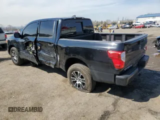 2024 Nissan Titan SV with VIN 1N6AA1EC2RN101063, listed as a Copart auction lot 49879235 with 12,418 mi miles and Salvage title. Bid and sale history available at DreamBid. Image 2.