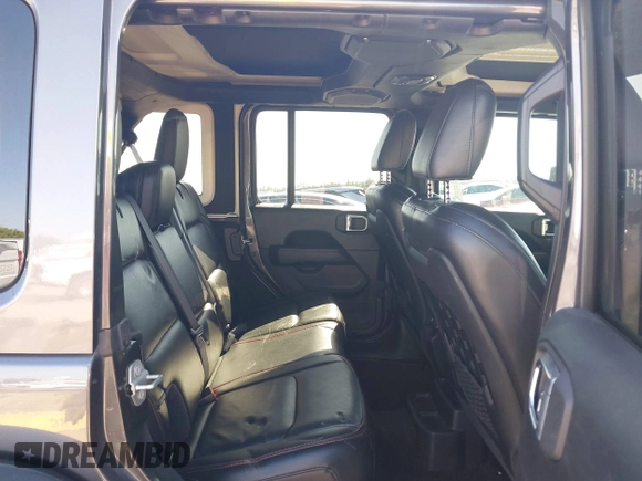 2020 Jeep Wrangler Unlimited Rubicon z VIN 1C4HJXFN0LW300344, wystawiony jako IAAI lot #41943662 z przebiegiem 59 051 mil mil oraz . Historia ofert i sprzedaży dostępna na DreamBid. Obrazek 8.