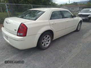 2005 Chrysler 300 Touring with VIN 2C3AA53G75H663208, listed as a IAAI auction lot 42180449 with 353,034 mi miles and . Bid and sale history available at carsss.com. Image 4.