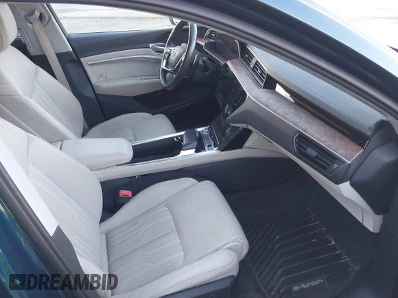 2019 Audi e-tron Prestige with VIN WA1VABGE0KB011579, listed as a IAAI auction lot 41027812 with 41,549 mi miles and . Bid and sale history available at DreamBid. Image 5.