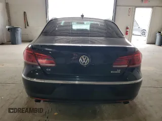 2015 Volkswagen CC Executive z VIN WVWGU7AN6FE809276, wystawiony jako Copart lot #54836135 z przebiegiem 134 565 mil mil oraz Tytuł czysty. Historia ofert i sprzedaży dostępna na DreamBid. Obrazek 6.