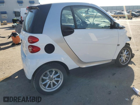 2010 Smart fortwo Pure with VIN WMEEJ3BA4AK341838, listed as a Copart auction lot 42514165 with 86,418 mi miles and Salvage title. Bid and sale history available at DreamBid. Image 3.