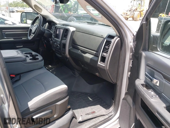 2023 Ram 1500 SLT z VIN 1C6RR7LG0PS517769, wystawiony jako IAAI lot #42451307 z przebiegiem 49 931 mil mil oraz . Historia ofert i sprzedaży dostępna na DreamBid. Obrazek 5.