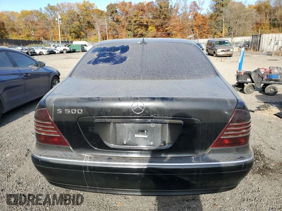 2003 Mercedes-Benz S-Class 5.0L with VIN WDBNG75J13A343070, listed as a Copart auction lot 77412604 with 154,533 mi miles and Salvage Title. Bid and sale history available at carsss.com. Image 6.