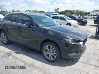 2025 Mazda CX-30 S Preferred with VIN 3MVDMBCM0SM798708, listed as a IAAI auction lot 42133091 with 4,305 mi miles and . Bid and sale history available at carsss.com. Image 1.