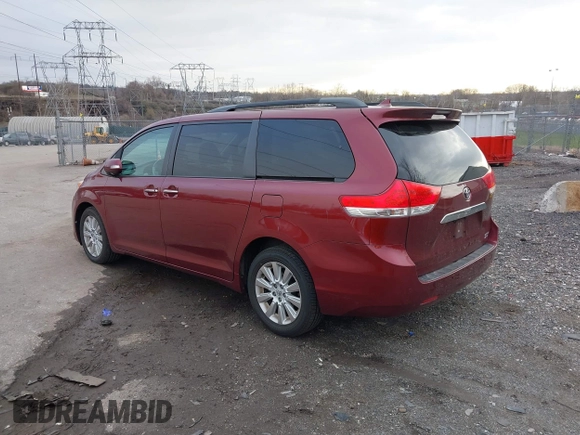 2013 Toyota Sienna XLE with VIN 5TDDK3DC1DS068215, listed as a IAAI auction lot 41610737 with 168,186 mi miles and . Bid and sale history available at DreamBid. Image 3.