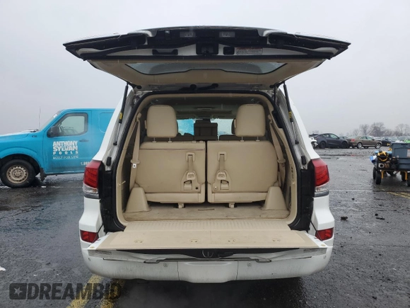 2015 Lexus LX 570 with VIN JTJHY7AXXF4185222, listed as a Copart auction lot 83833874 with 165,154 mi miles and Salvage Title. Bid and sale history available at DreamBid. Image 6.