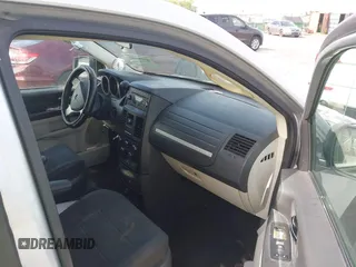 2008 Dodge Grand Caravan SE with VIN 1D8HN44H68B100343, listed as a IAAI auction lot 42126581 with 228,669 mi miles and . Bid and sale history available at DreamBid. Image 5.