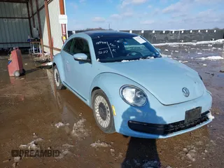 2013 Volkswagen Beetle Fender Edition with VIN 3VWJP7ATXDM658717, listed as a IAAI auction lot 41278621 with 69,338 mi miles and . Bid and sale history available at DreamBid. Image 1.